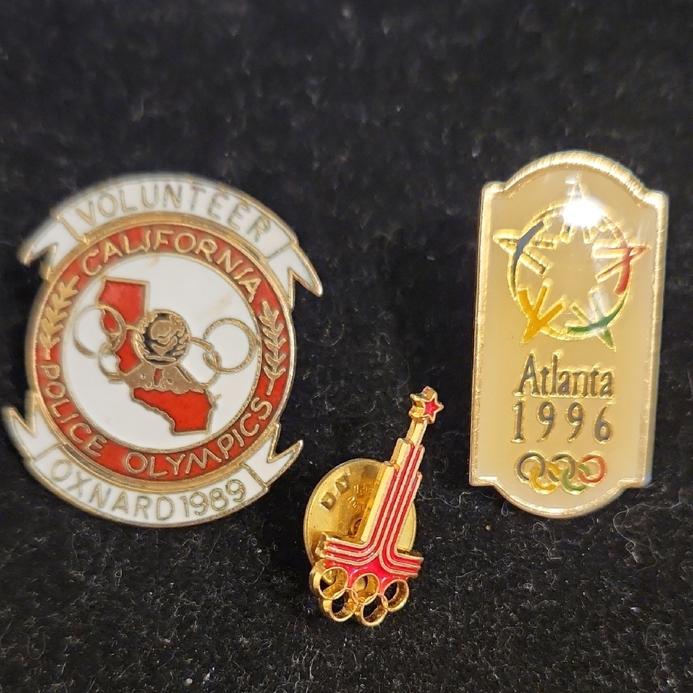Source Unknown Gold and Red Olympic Pins Set